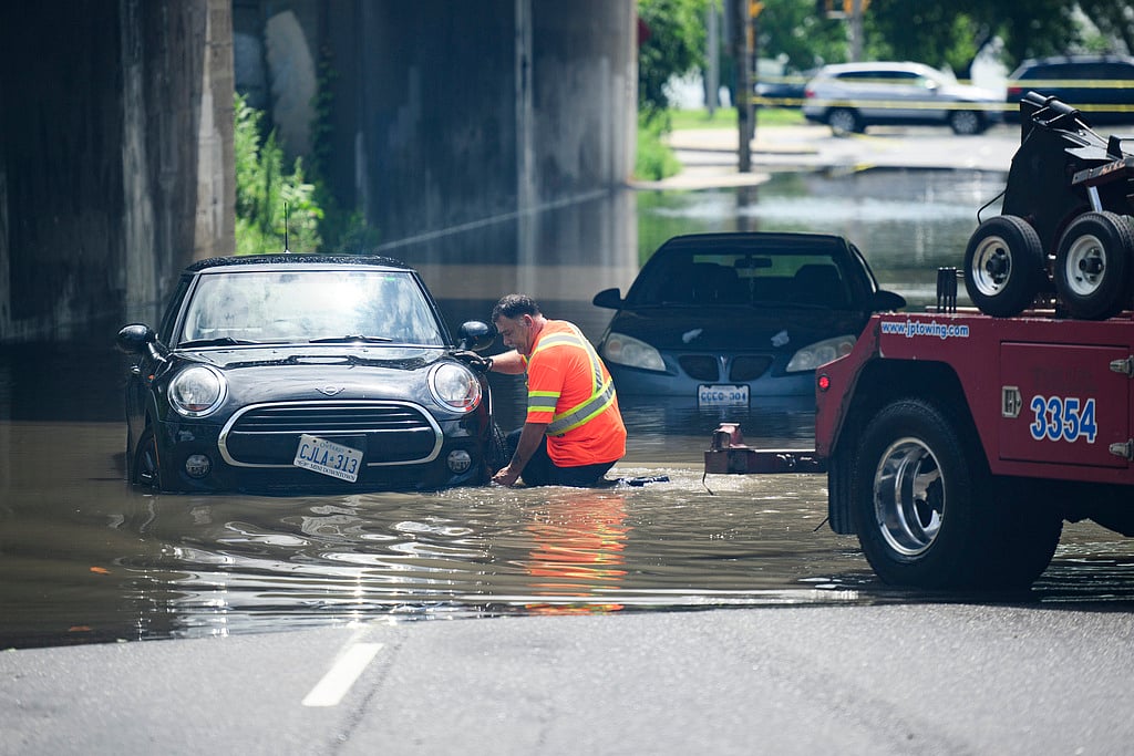 | Photo: AP : Torrential Rains Over Canada's Largest City Shut Down Highways, Roads And Electricity 